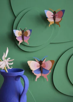 Wanddeko Papier 'Gedämpftes Flügel-Trio'
