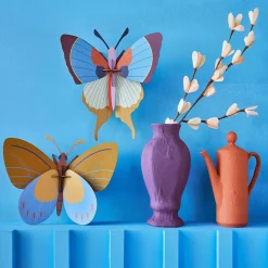 Wanddeko Papier 'Leuchtende Flügel'
