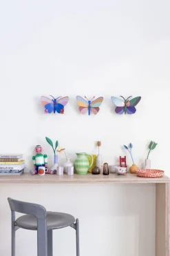 Wanddeko Papier 'Leuchtender Schmetterling'