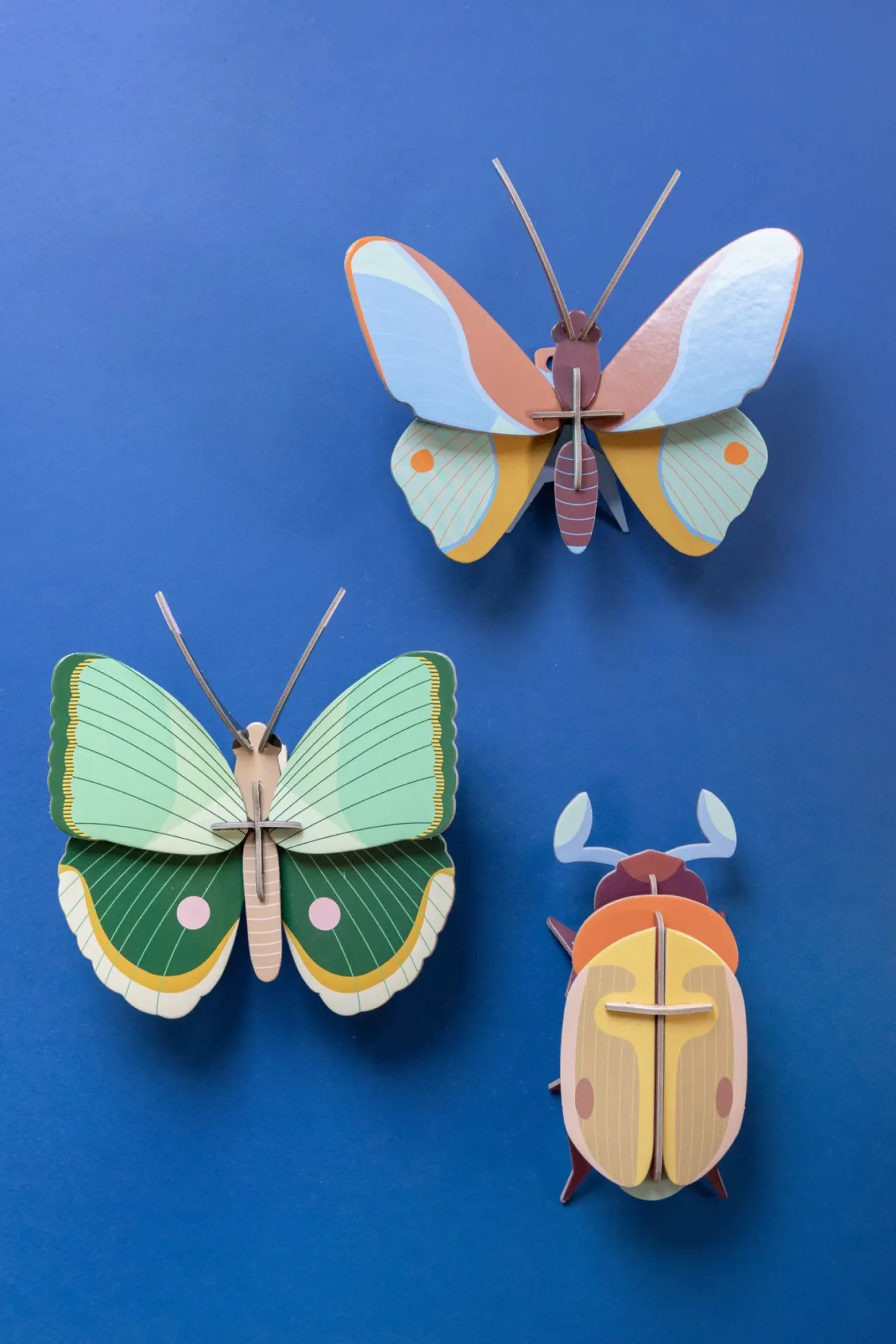 Wanddeko Papier 'Leuchtender Flügel'
