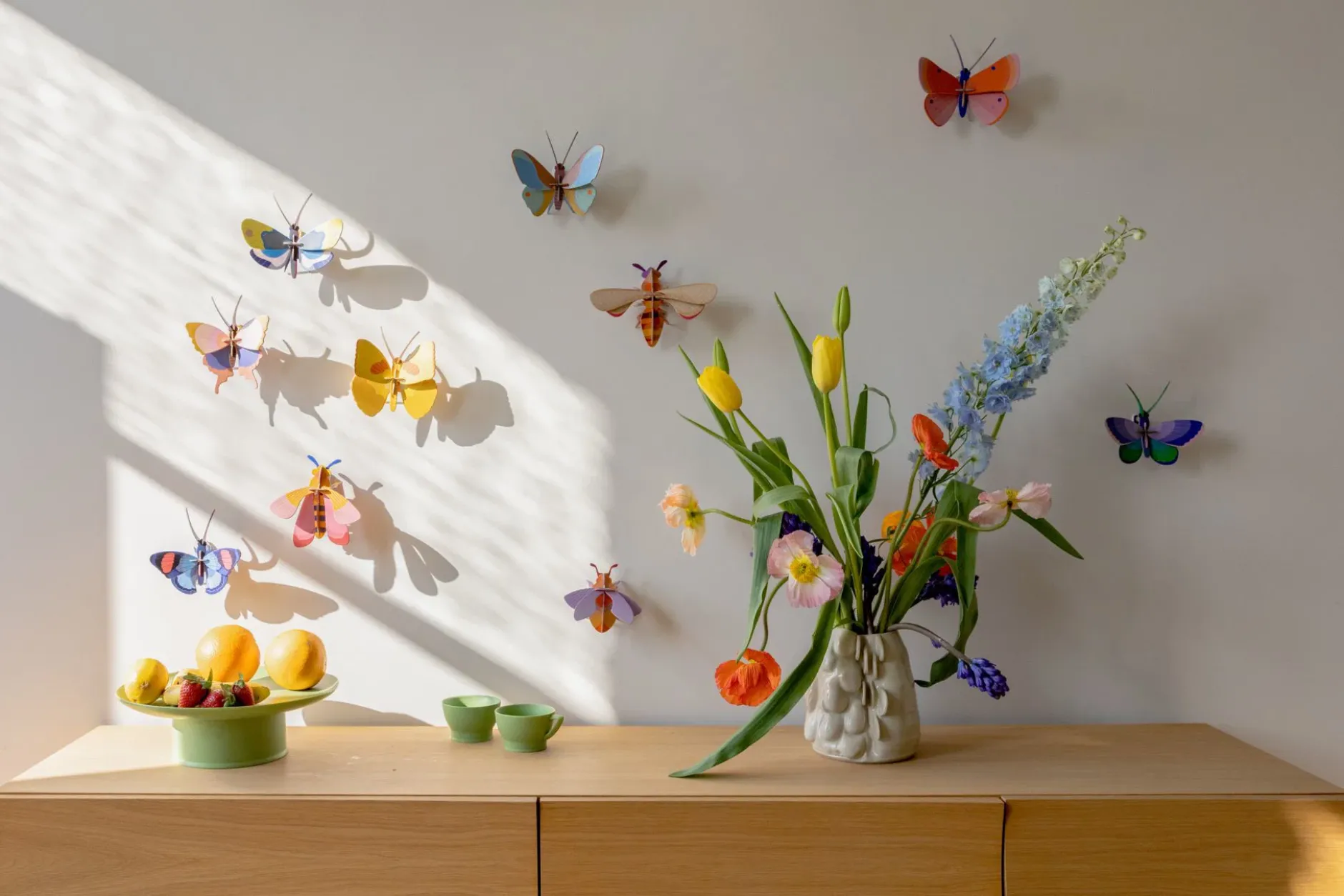 Wanddeko Papier 'Leuchtender Flügel'